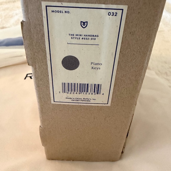 New in Box & Authentic Rothy’s The Mini Hand Bag - Piano Keys - Picture 4 of 8